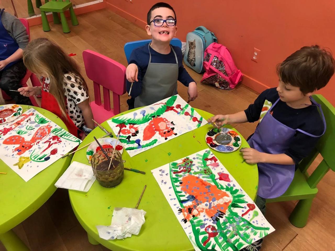 Children participating in art projects